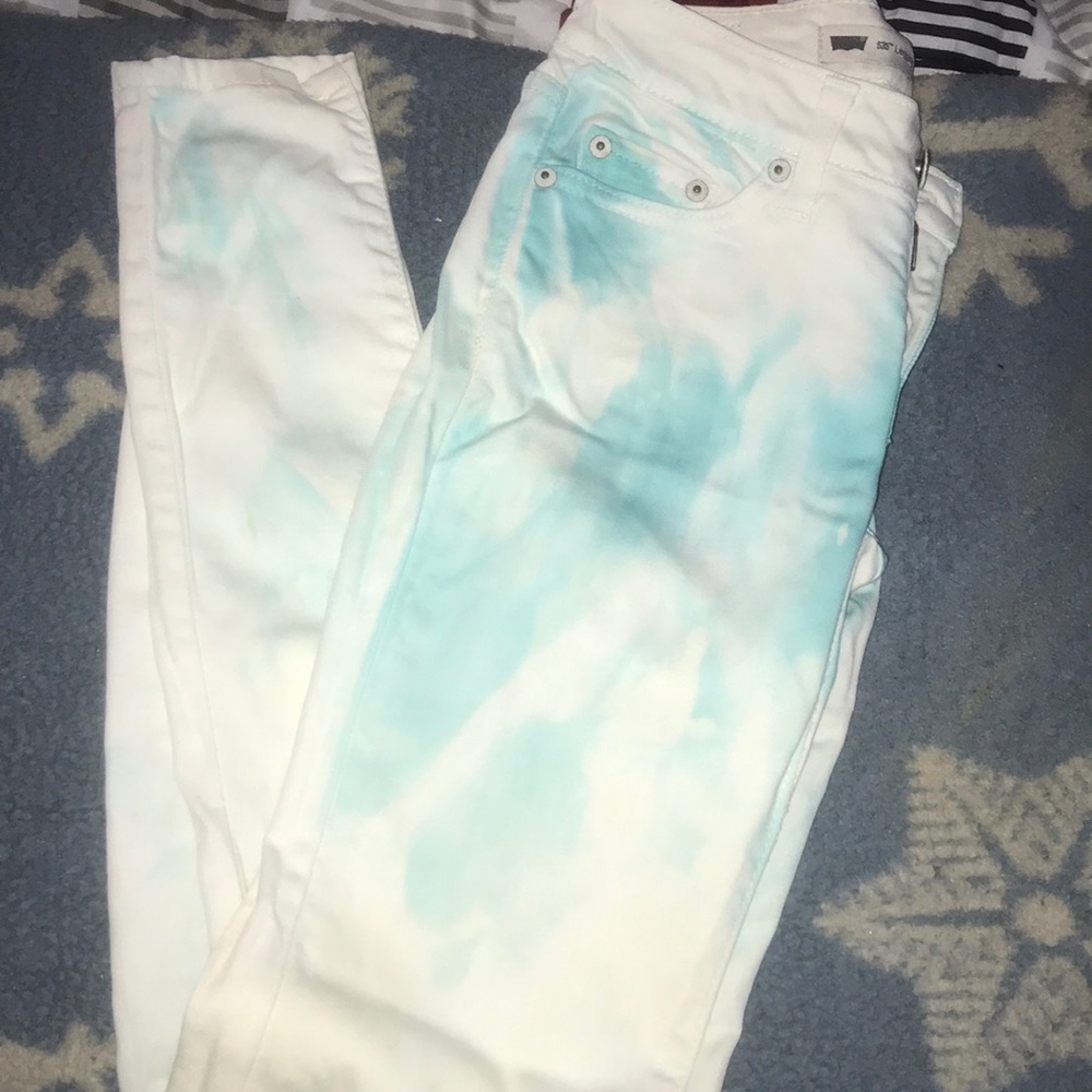 Levi Pants , They are faded with color blue/white